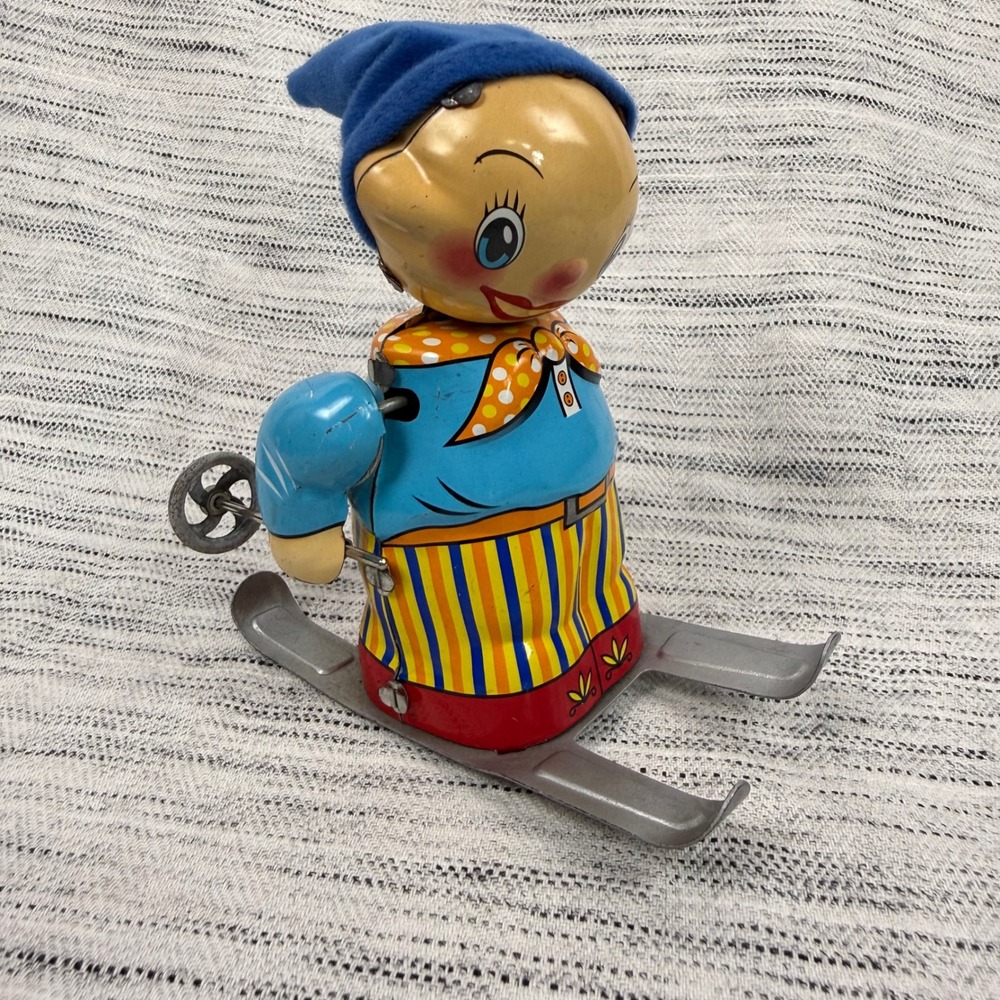 Vintage Tin Toy Little Skier Rolling Metal Felt Primitive Retro Tchotchke Decor